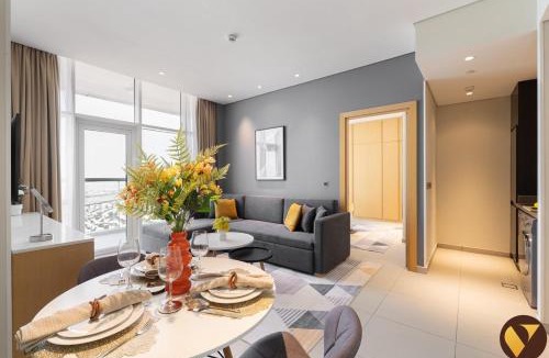 Jumeirah Village Triangle Apartment | Vogue Vacation Homes, Novotel Residences JVT near Springs Souk Mall, One Bedroom apartment with Balcony and Vibrant Community View, Access to all Amenities