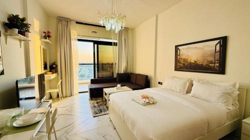 International City Apartment | Petalz Luxury furnished studio with Balcony Swimming Pool Gym Kids play ground