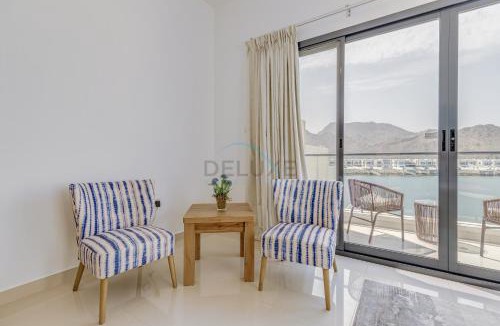 Sharm Apartment | Coastal Escape with Private Pool, Breathtaking Sea And Mountain Views, Near Al Aqah Beach - Al Dana Island, Fujairah by Deluxe Holiday Homes