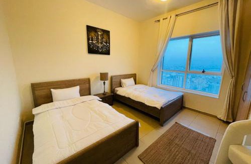 Ajman Apartment | Luxury Sea View ROOM with 2 BED