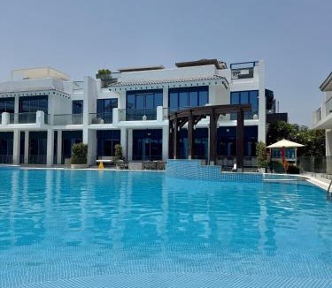 Palm Jumeirah Villa | Stunning Palm Villa with Rooftop Garden, Resort Style Pool and Beach by Exclusive Holiday Homes
