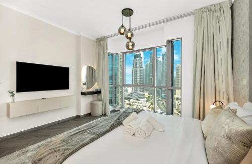 Downtown Dubai Apartment | Skyline Serenity Holiday Home I Luxe 4 bedroom Apartment I Burj Khalifa & Fountain Views I Free Gym, Pool, Parking, Wi-Fi and PS5