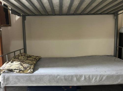 Dormitory bed space in a shared room